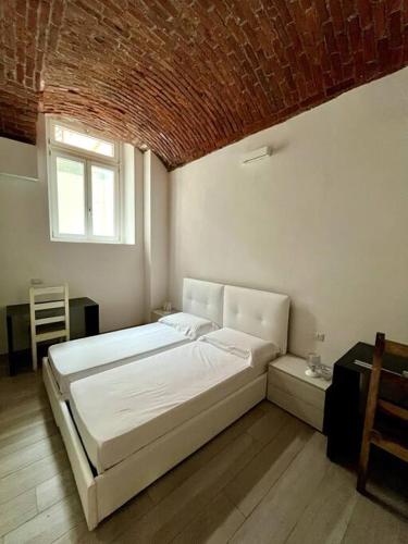 Postel nebo postele na pokoji v ubytování Immense Secret Cave