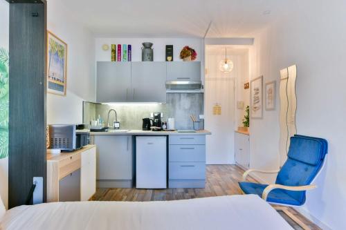 LE FESTIF splendide studio avec loggia au Carré d'Or