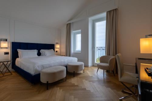 Postel nebo postele na pokoji v ubytování Bluonly Boutique B&B