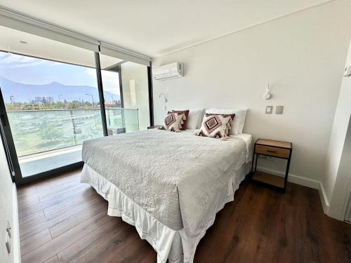 Una cama o camas en una habitación de Espacio Manquehue