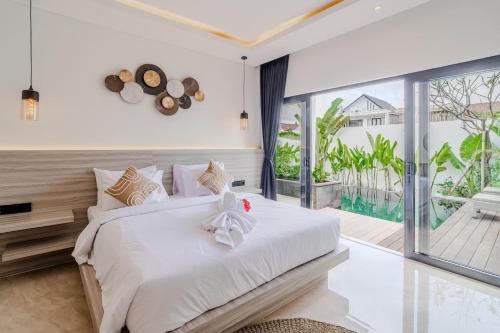 Postel nebo postele na pokoji v ubytování Luxury Villa 2br In Padonan Canggu