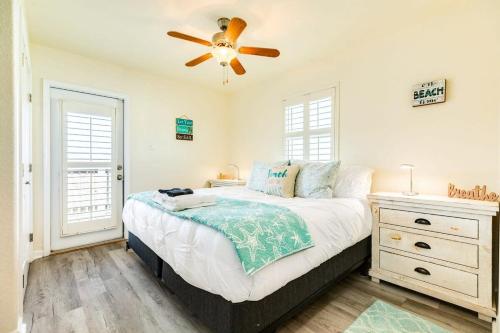 a bedroom with a bed and a ceiling fan at Breathtaking Island Views from Multiple Decks! in Surfside Beach