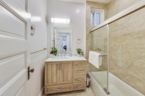 a bathroom with a sink and a shower at In The Heart Of Haight Ashbury 5 Bedroom House in San Francisco
