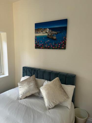 Ein Bett oder Betten in einem Zimmer der Unterkunft Urban Studio Finchley