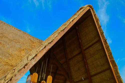 a view from below of a roof with a group of shoes at Lipsos Private Luxury Beachfront home in Progreso