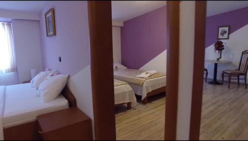 Katil atau katil-katil dalam bilik di The Two Hearts Hotel