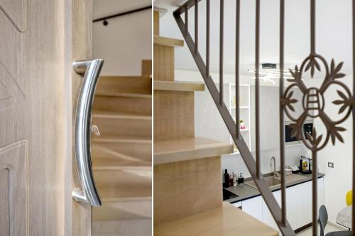 a staircase with a metal handrail and a stair case at Locazione Turistica Arcobaleno "Appartamento Deluxe" in Roccavivara