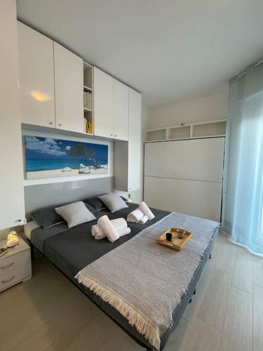 Ένα ή περισσότερα κρεβάτια σε δωμάτιο στο Coccola a due passi dal mare