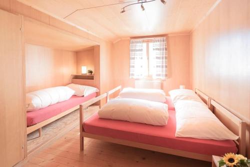 Postel nebo postele na pokoji v ubytování Chalet Aurora