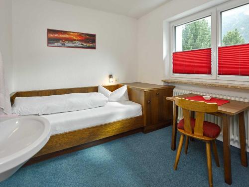 Ένα ή περισσότερα κρεβάτια σε δωμάτιο στο Haus Frieda