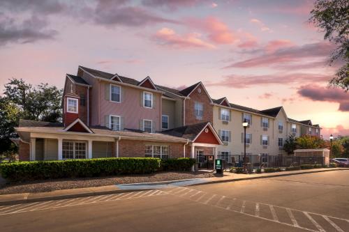 a rendering of a building with a street in front at MainStay Suites Houston NASA-Clear Lake in Webster