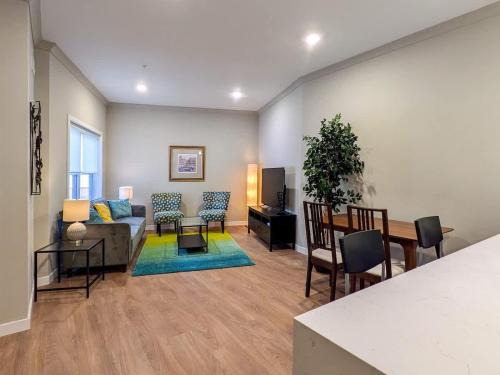 a living room with a couch and a table at 213 Brand New 3 Bedroom 2 Bath 1 Full Kit 1 Liv in Dunellen
