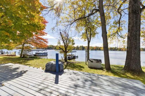 a dock with a view of a lake at Lakefront Home with Dock Firepit & Private Deck in Grand Junction
