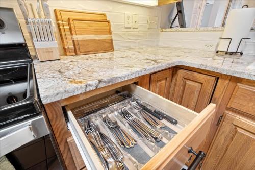 a kitchen with an empty drawer in a counter at Beautiful 3 bed 2 bath home near Crystal Bridges in Bentonville