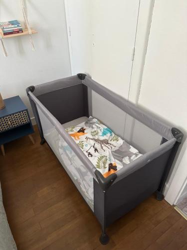 Postel nebo postele na pokoji v ubytování Bienvenu à l’appart bien-être