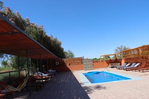 Πισίνα στο ή κοντά στο Peumayen Atacama cabaña&Hostal