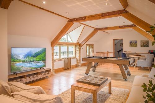 Hardwick Lodgeにあるテレビまたはエンターテインメントセンター