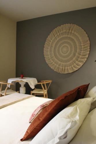 Ένα ή περισσότερα κρεβάτια σε δωμάτιο στο Pumo Home - Apulian Luxury Rooms