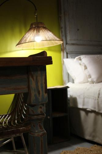 Ένα ή περισσότερα κρεβάτια σε δωμάτιο στο Pumo Home - Apulian Luxury Rooms