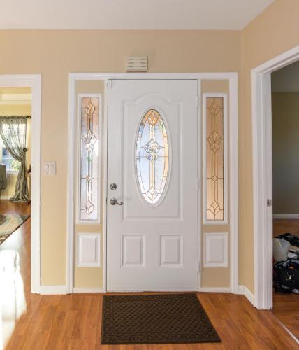 a room with a white door with a window at Spacious bright room in Prime Silicon valley location in East Palo Alto