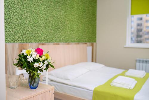 Postel nebo postele na pokoji v ubytování Urban Hotel