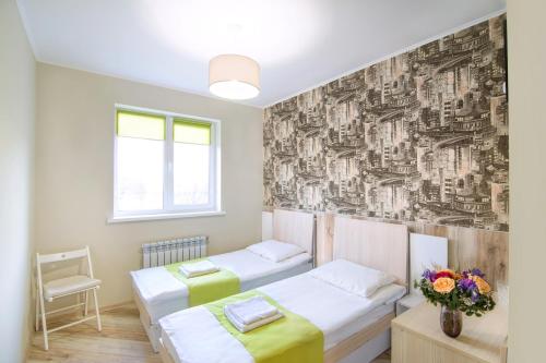 Postel nebo postele na pokoji v ubytování Urban Hotel