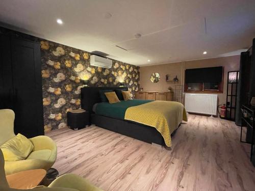Ένα ή περισσότερα κρεβάτια σε δωμάτιο στο Ermerlodge
