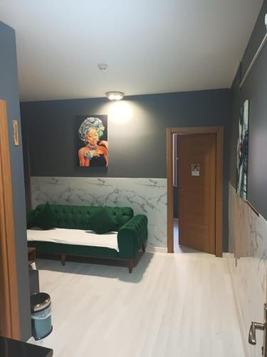 Ένα ή περισσότερα κρεβάτια σε δωμάτιο στο Arena Apart Hotel