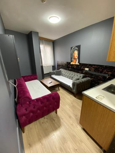 Ένα ή περισσότερα κρεβάτια σε δωμάτιο στο Arena Apart Hotel