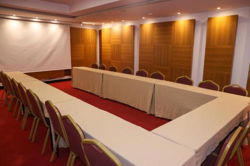 a conference room with a long table and chairs at The Hera Platinum Hotel in Istanbul