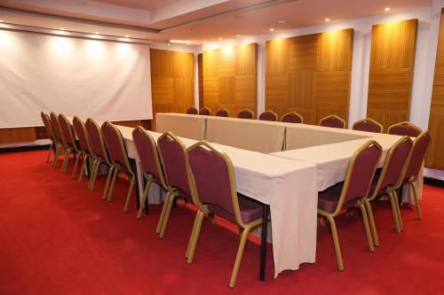 a conference room with a white table and chairs at The Hera Platinum Hotel in Istanbul