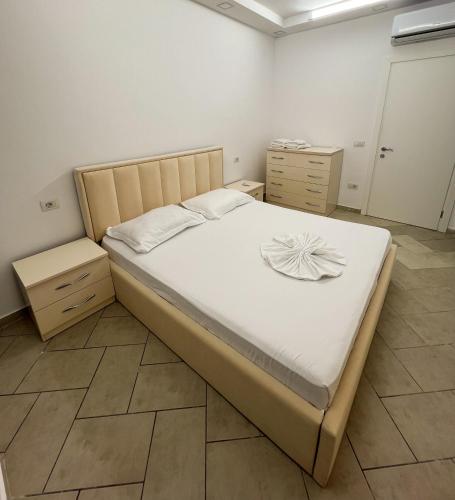 Ένα ή περισσότερα κρεβάτια σε δωμάτιο στο Sea View Apartments
