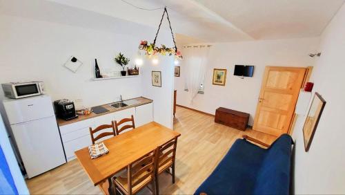 Kuchyň nebo kuchyňský kout v ubytování Appartamento in Monferrato di domInga