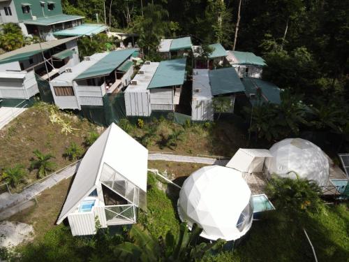an overhead view of a bunch of houses with domes at HOTEL, VILLAS y GLAMPINGS MYA -PUERTO VIEJO, Limon, CR in Puerto Viejo