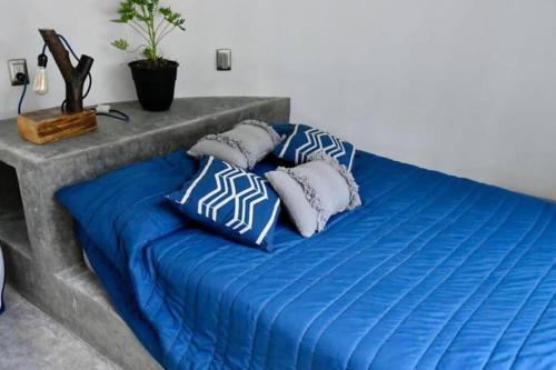 Postel nebo postele na pokoji v ubytování Casita Passiflora