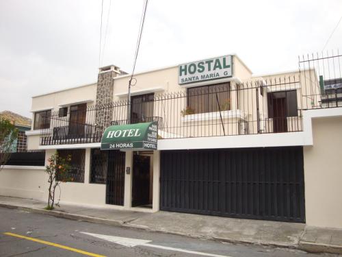 a hotel on the corner of a street at Hostal Santa María Gracia in Quito