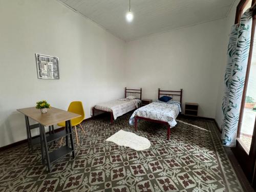 Residencia para jóvenes en Paysanduにあるベッド