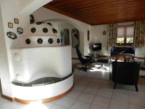 a living room with a pizza oven in a room at Haus Franz by ISA AGENTUR in Bad Kleinkirchheim