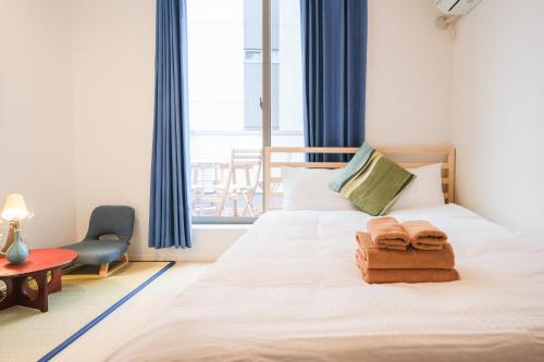 Postel nebo postele na pokoji v ubytování SOMO-Villa