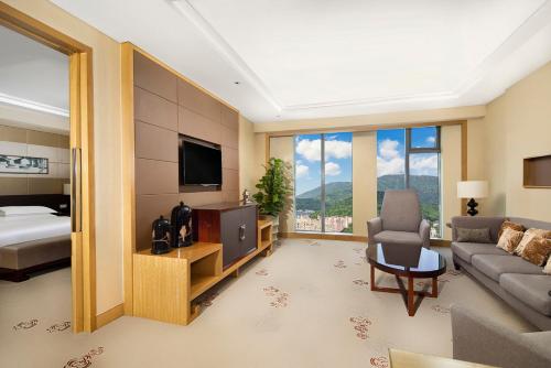 Televisyen dan/atau pusat hiburan di Sheraton Wuxi Binhu Hotel