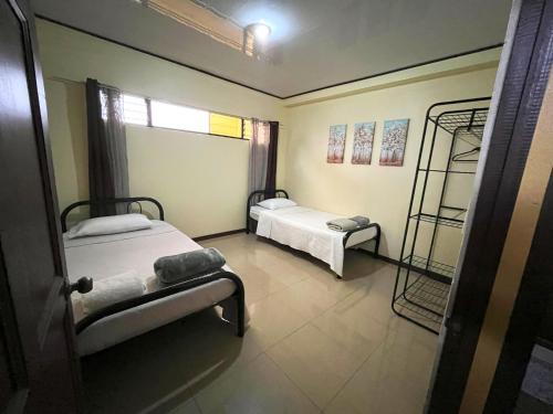 Postel nebo postele na pokoji v ubytování Apartamentos Guzmán