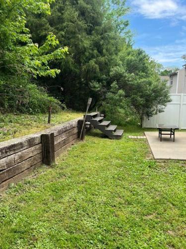 a park with a bench and a picnic table at Beautiful home near Carowinds, Ballantyne in Fort Mill