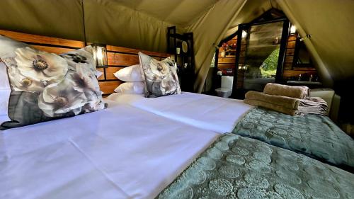 Ένα ή περισσότερα κρεβάτια σε δωμάτιο στο ArendsRus Country Resort