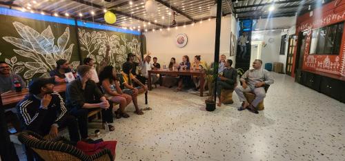 a group of people sitting in a room at Hammock Hostels - Bandra in Mumbai