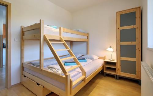Postel nebo postele na pokoji v ubytování Apartment Marketa