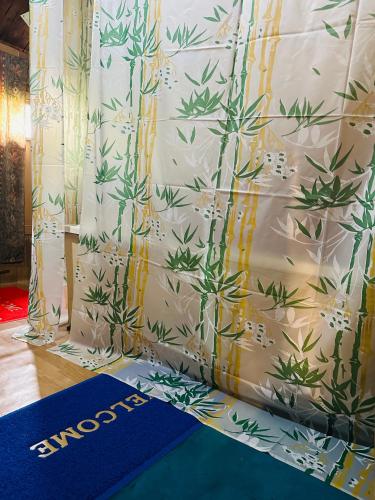 a curtain with a floral pattern on it at H.B Rocket paradise in Srinagar