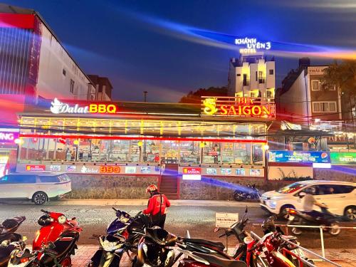 a group of motorcycles parked in front of a store at Đà Lạt center Ho Cozy in Da Lat