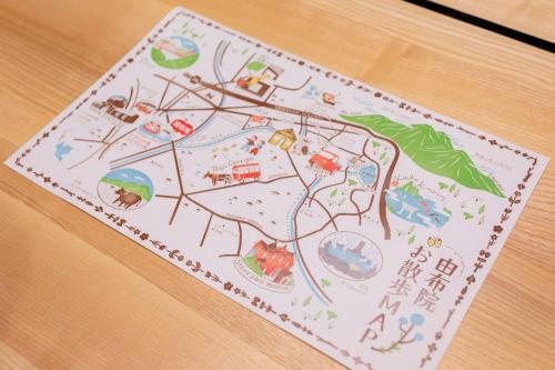 a drawing of a map on a table at 貸し切り宿 世紡 YOTSUMUGI sakazuki and iyasaka in Yufuin
