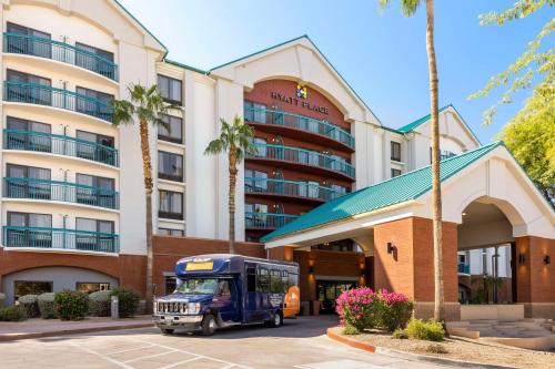 a bus parked in front of a hotel at Hyatt Place Tempe Phoenix Airport in Tempe
