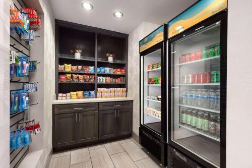 a refrigerator filled with lots of food and drinks at La Quinta by Wyndham Williams-Grand Canyon Area in Williams